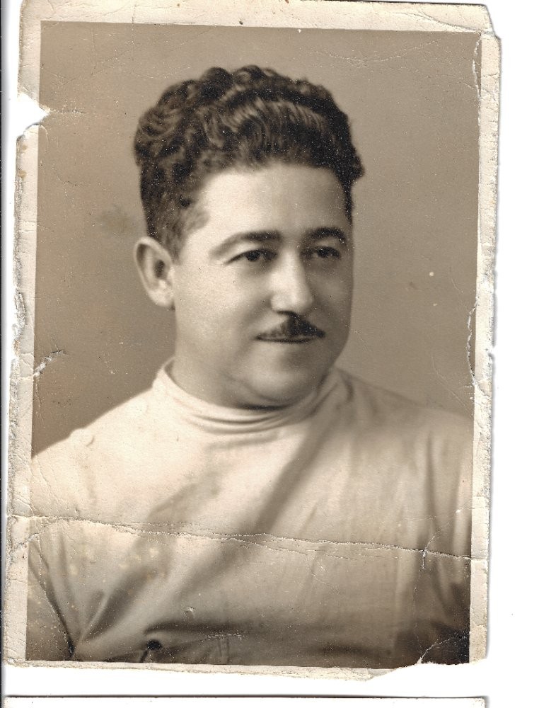 Black and white portrait photograph of Victor S. Ortiz, R.Ph., founder of Ortiz Pharmacy, licensed pharmacist in 1930